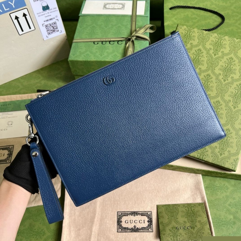 G*u*i clutch bags